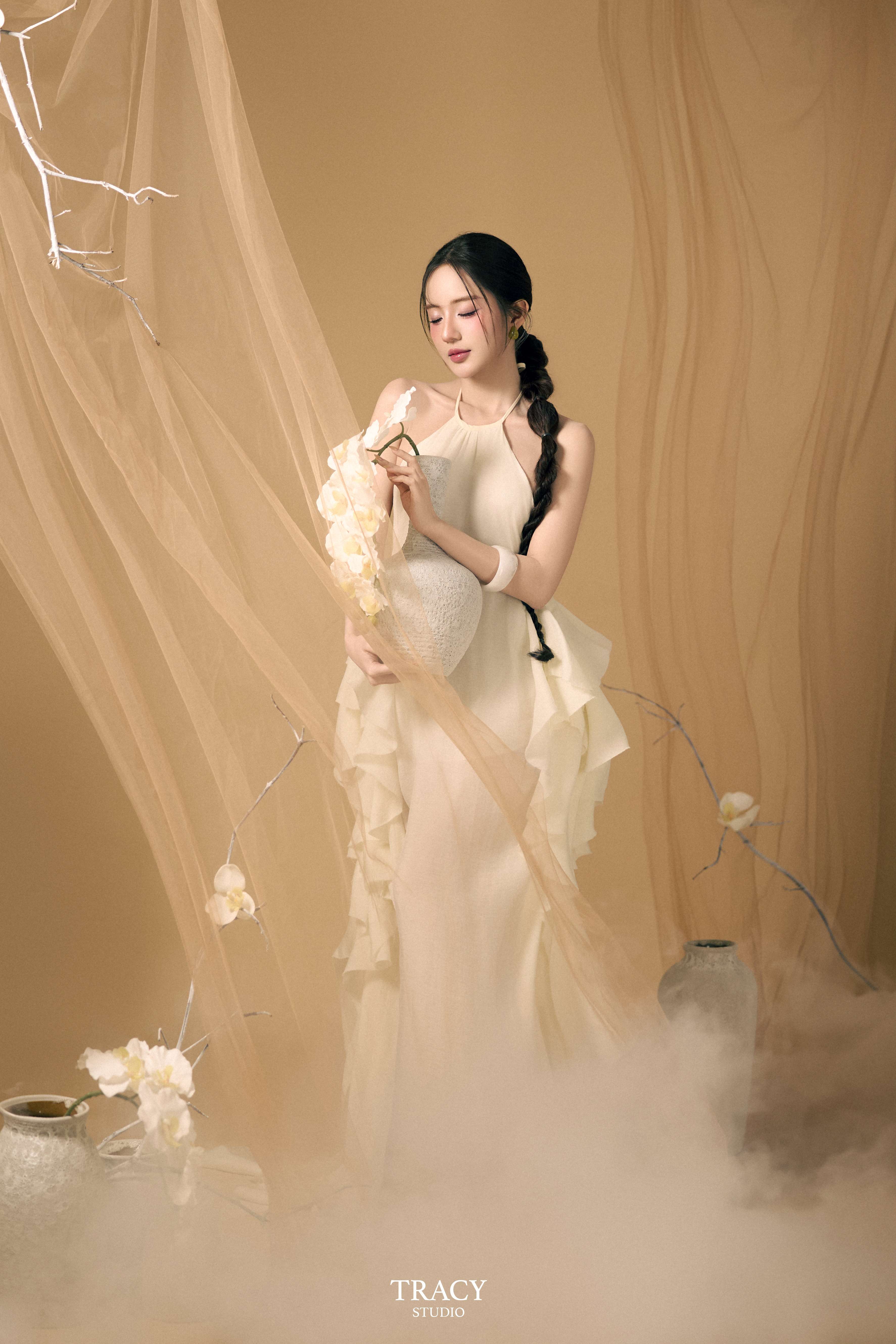 frontend/img/gallery/anh-tet-yem-ao-dai/tracy-studio-chup-concept-yem-tet-van-khe (5).jpg